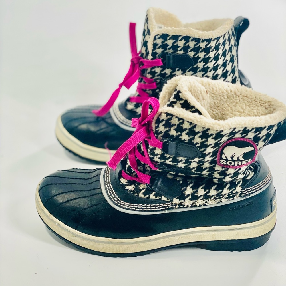 Sorel black and white fur lined booties